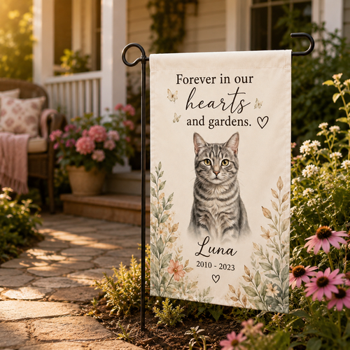 Cat memorial garden flag with photo name and years displayed outdoors